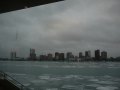 The view of Windsor, Canada from across the Detroit river inside the Cobo Hall river view area.