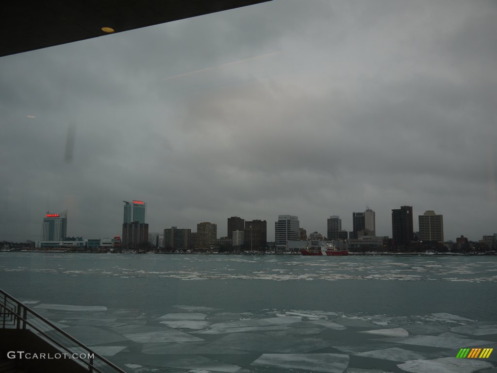 The view of Windsor, Canada from across the Detroit river inside the Cobo Hall river view area.