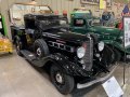 1936 REO Speedwagon Pickup Truck next to it's twin A Mack Jr. Pickup Truck