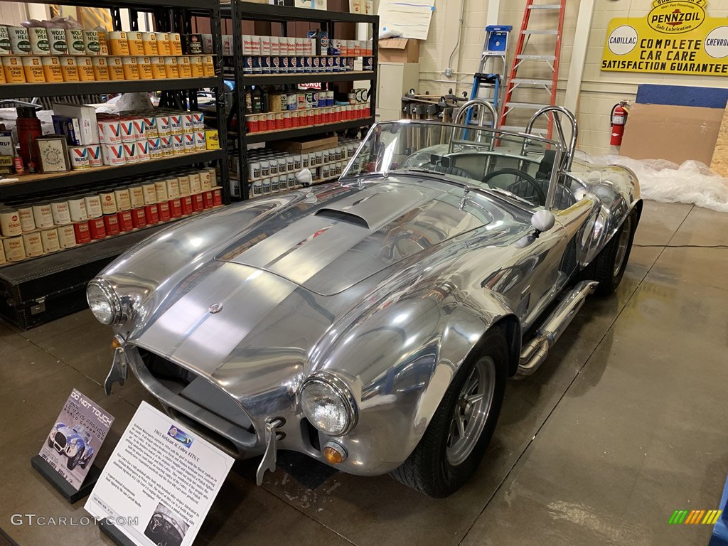 1965 Kirkham AC Cobra 427S/C in polished alloy w/brushed alloy stripes.