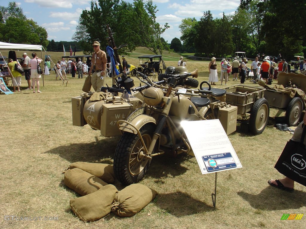 Guns amunition trailers and a cannon