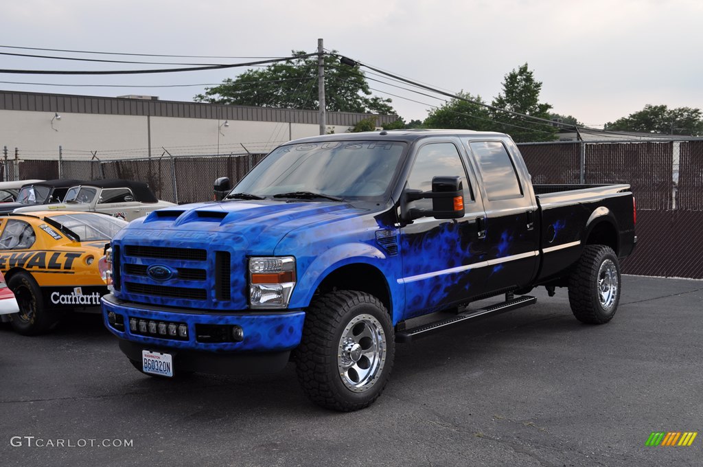 Ford F350, Looks like a Roush She-Devil Racing Support Vehicle, with the blue flames.