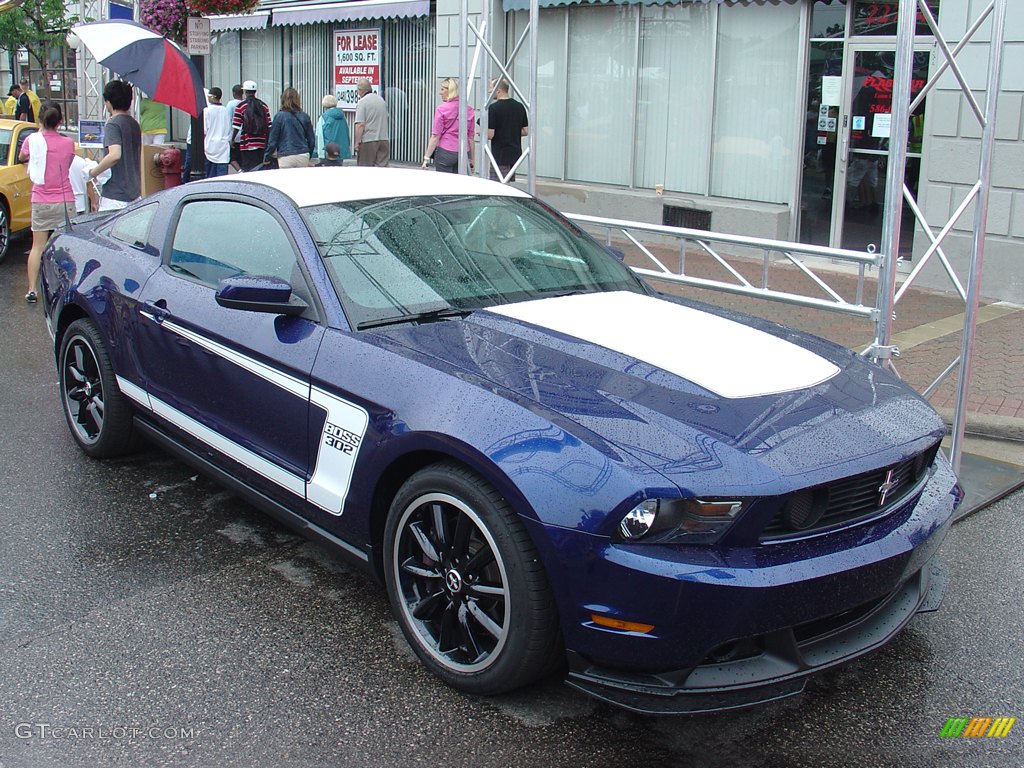 2012 Ford Mustang Boss 302 in Kona Blue at the Woodward Dream Cruise Ford Display