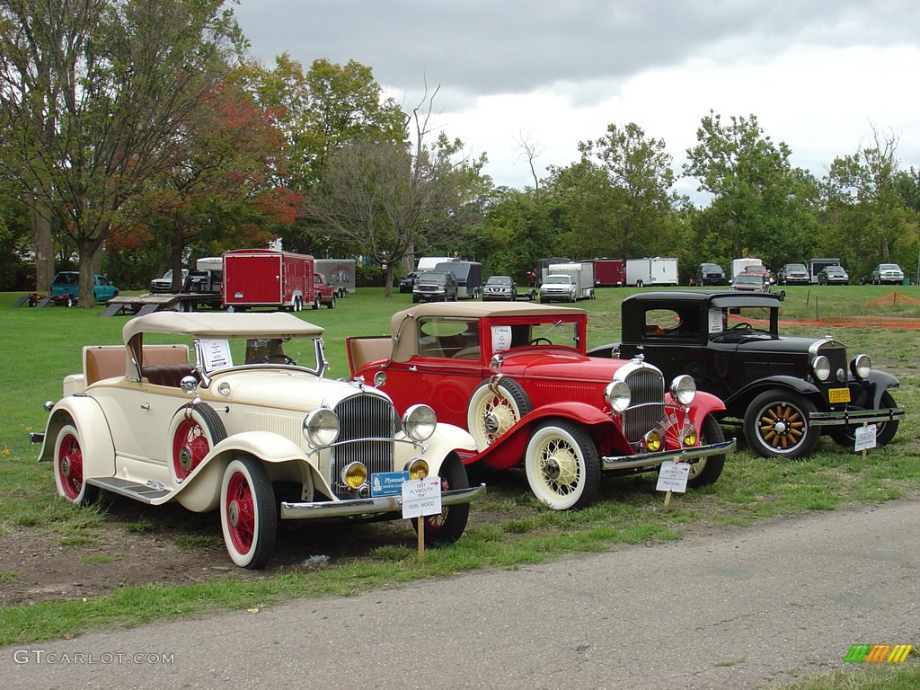 A line of 1931 Plymouths