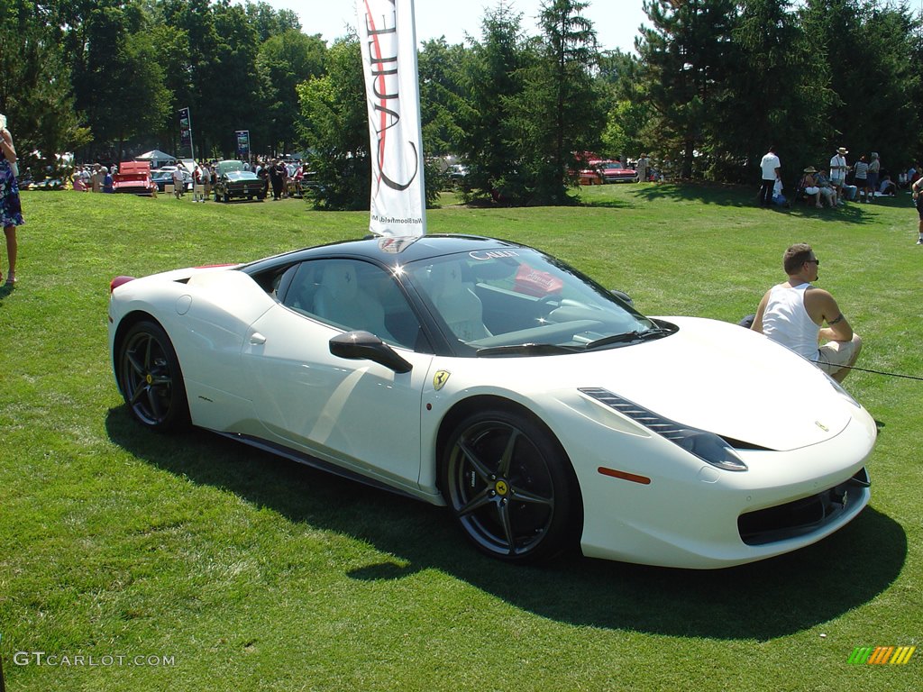 2011 Ferrari 458 Italia, 570hp top speed 202mph.