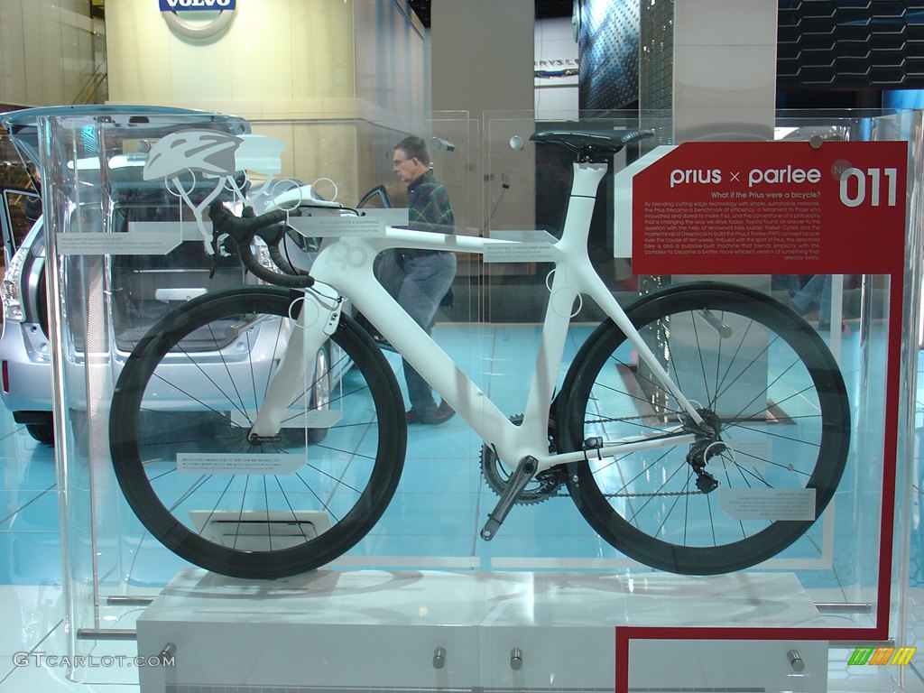 Prius x Parlee Bicycle, all carbon fiber frame and wheels, electronic neuro-shift helmet, and built in smart phone dock.