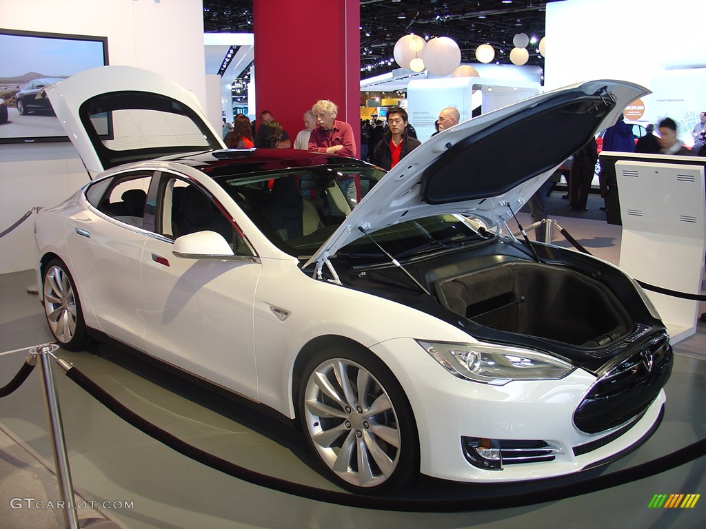 2012 Tesla Model S, 0 to 60 mph in 4.4 seconds and a top speed of 130 mph with the 85 kWh battery