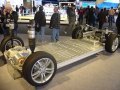 Tesla Model S,  lithium-ion battery chassis with suspension, powertrain, and wheels